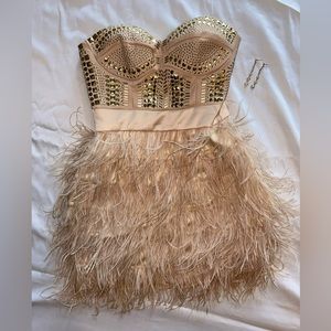 XS cream gold beaded bebe dress with feathers.